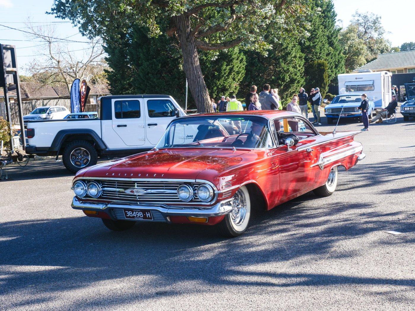 Chevrolet Impala coupe in red
