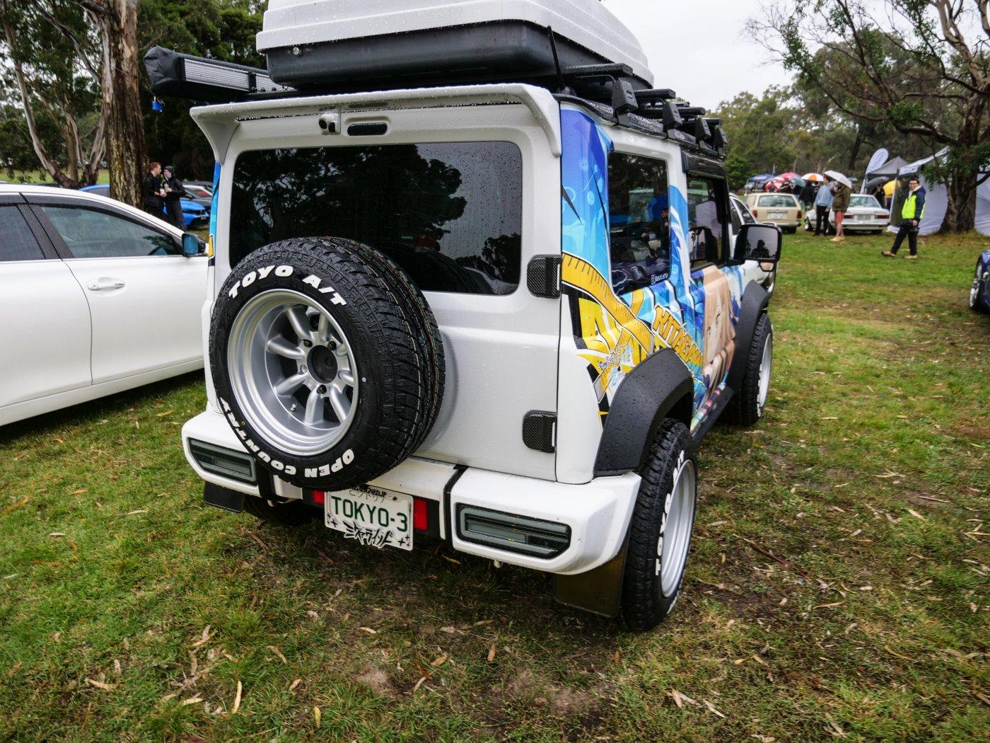 Suzuki Jimny covered in anime graphics